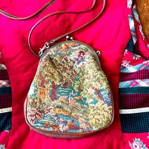 Vintage inspired tapestry crossbody purse.